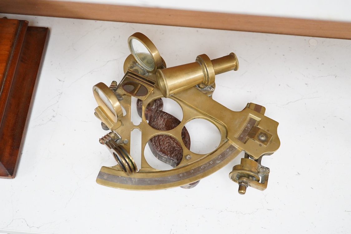 A late 19th century brass sextant by Ryland & Son Ltd. London, with later oak grip